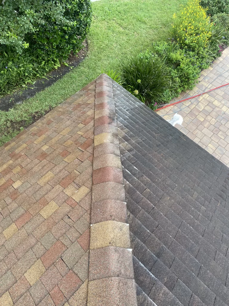 Pressure washing in Jacksonville, FL cleaning a residential roof surface