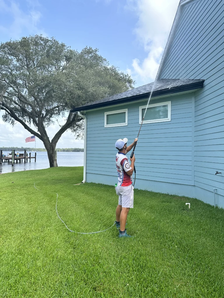 Professional pressure washing company cleaning a residential property in Mandarin, FL