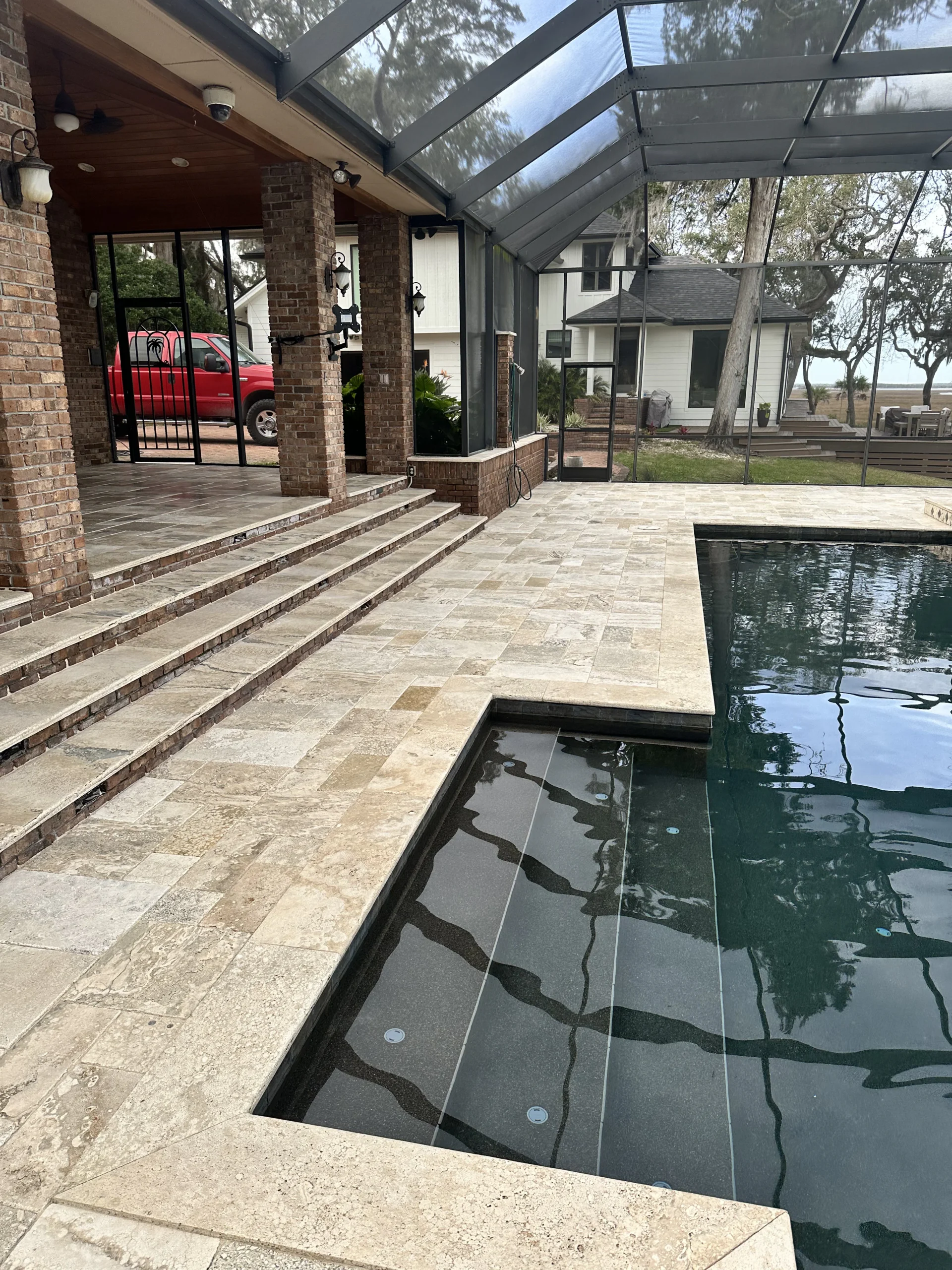 Paver pool deck and patio evaluated for resealing in Mandarin, FL
